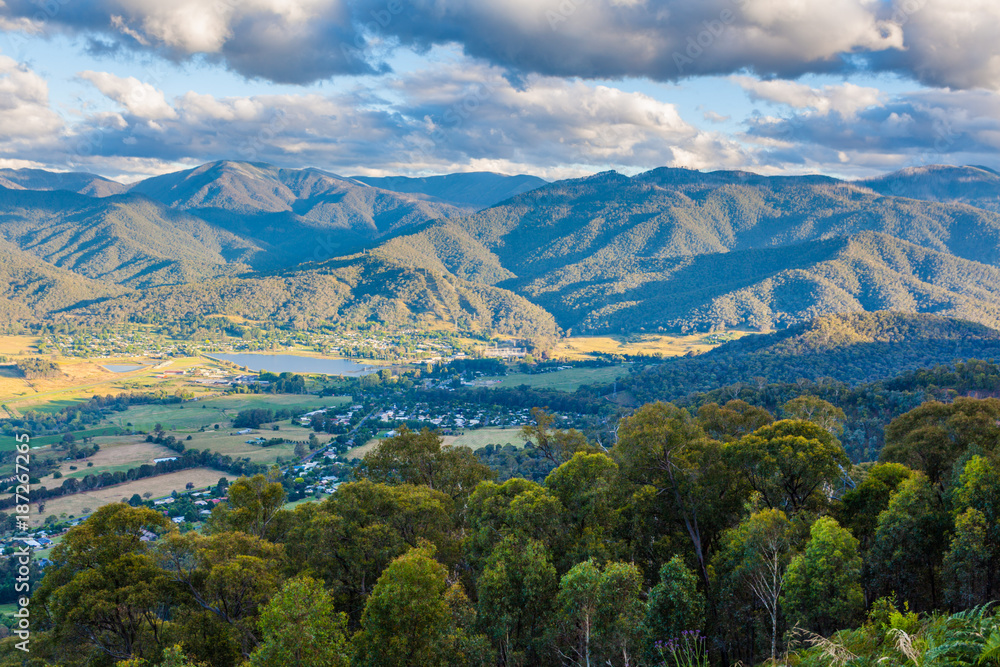 Aerial view of Mount Beauty town and pondage at sunset. Kiewa valley, Victoria, Australia