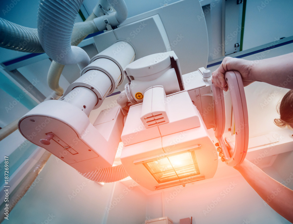 Xray room in a hospital. Classic ceilingmounted xray system. Stock