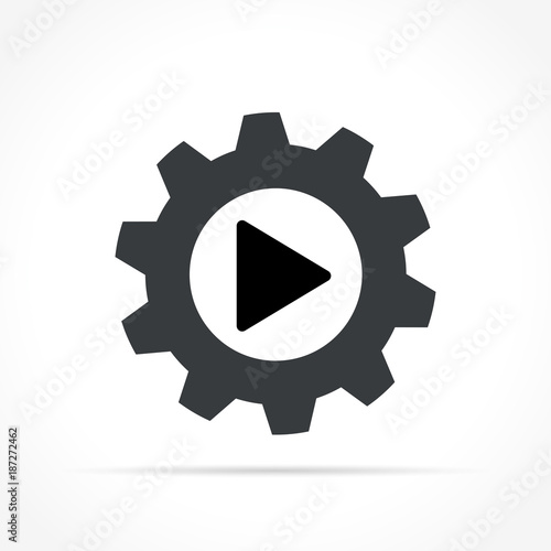 gear and play icon on white background