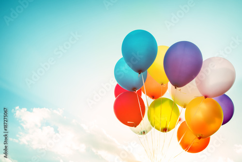 Colorful balloons done with a retro instagram filter effect. Concept of happy birth day in summer and wedding, honeymoon party use for background. Vintage color tone style