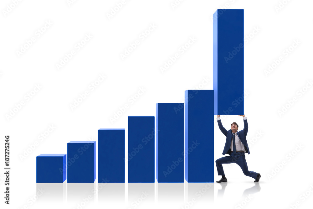 Businessman supporting growtn in economy on chart graph Businessman supporting growtn in economy on chart graph