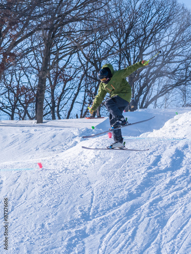 People are having fun in downhill skiing and snowboarding