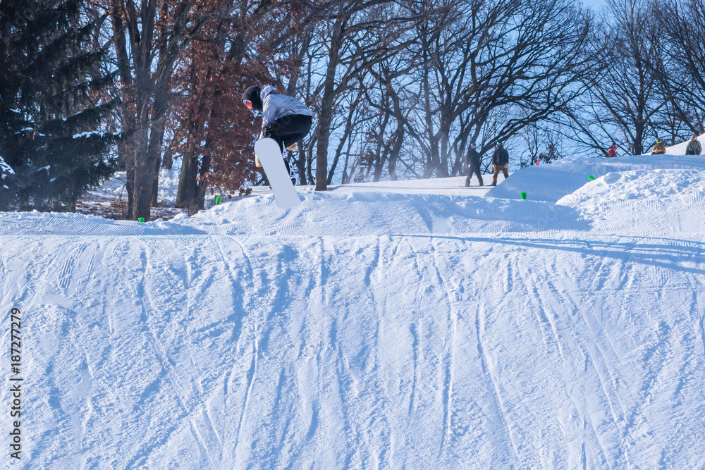 Fototapeta premium People are having fun in downhill skiing and snowboarding 