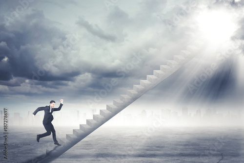 American businessman running on the staircase