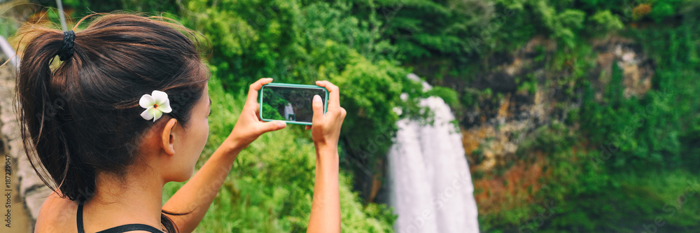 Hawaii travel tourism tourist woman taking picture