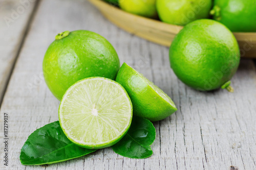 Lime slices on wooden.