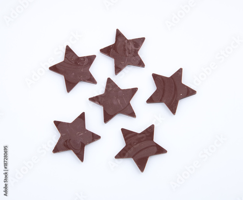 Chocolate or chocolate star on a background.