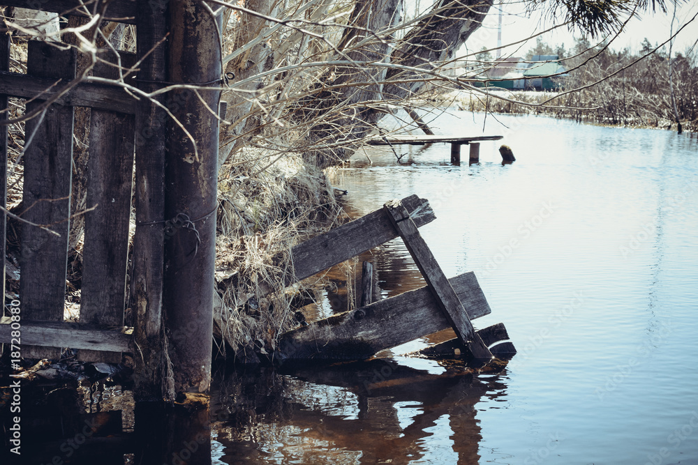 Wooden fence on the river
