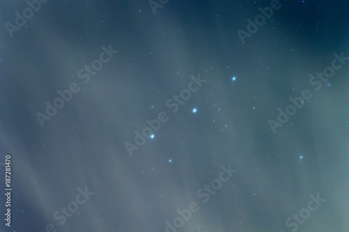 Orion Belt, Cloudy Night sky Background photo