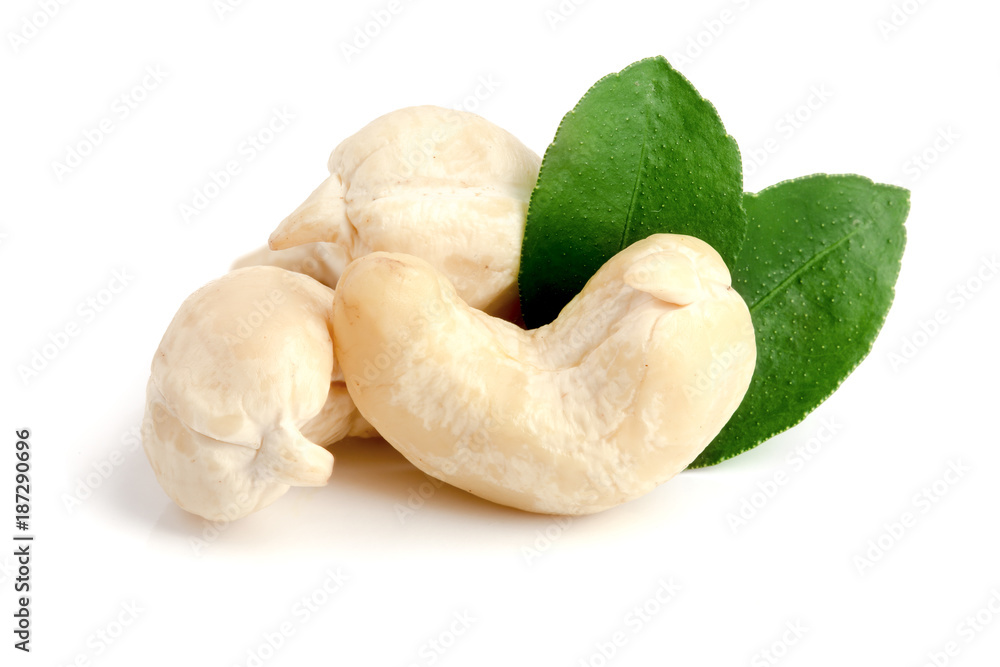 cashew nuts with leaf isolated on white background. macro cashew nuts with leaf isolated on white background. macro