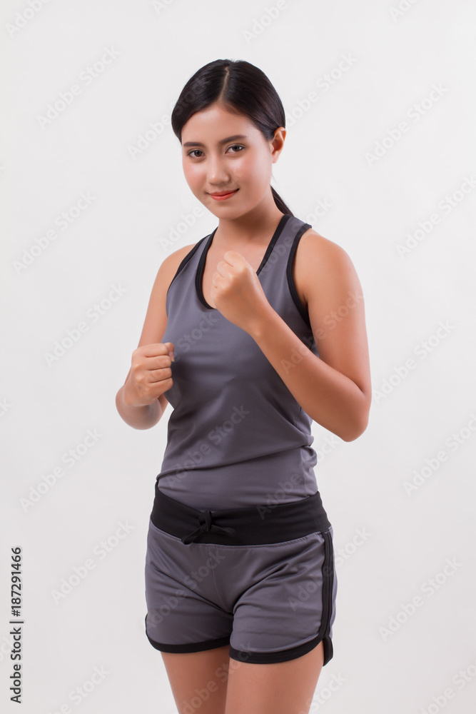 confident happy smiling fitness woman isolated confident happy smiling fitness woman isolated