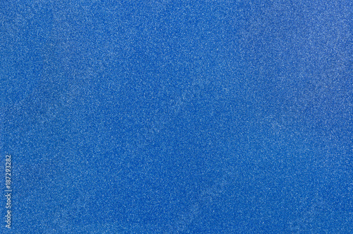 Dark blue glitter texture background.