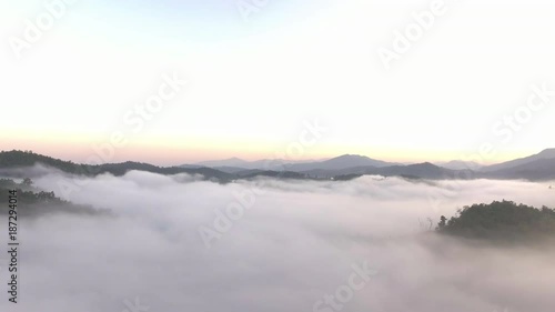 Wallpaper Mural aerial shot : cloud surfing in mountain range sunrise background Torontodigital.ca