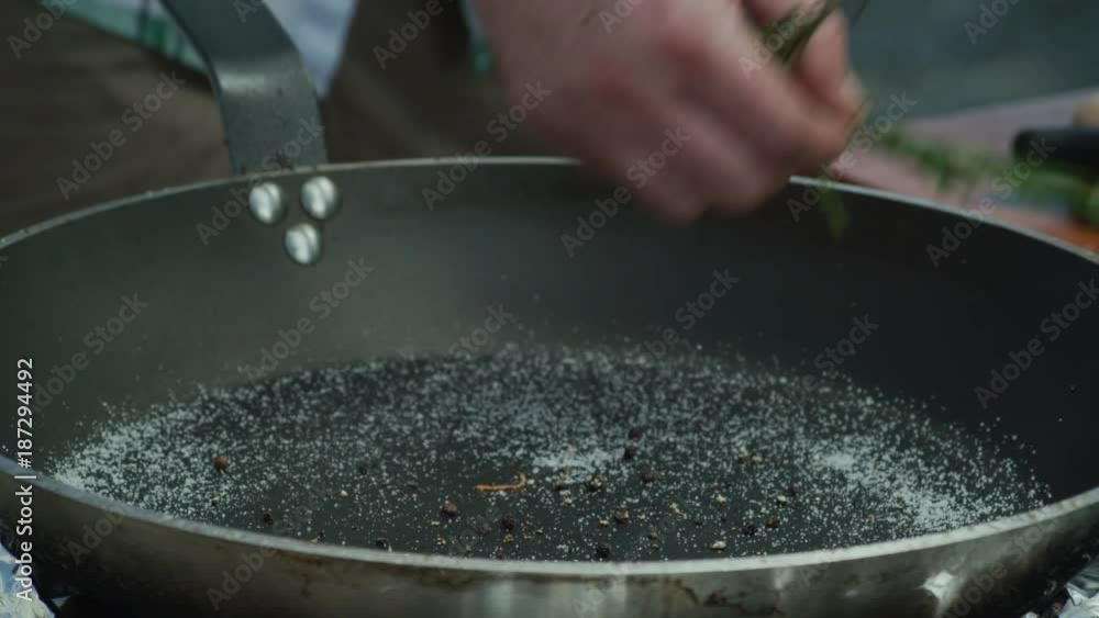 Frying fresh Salmo ohridanus - belvica in a frying pan Frying fresh Salmo ohridanus - belvica in a frying pan
