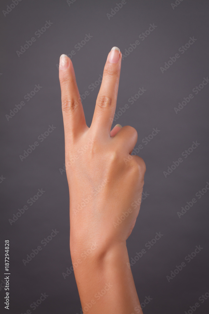 hand showing rude v sign hand showing rude v sign
