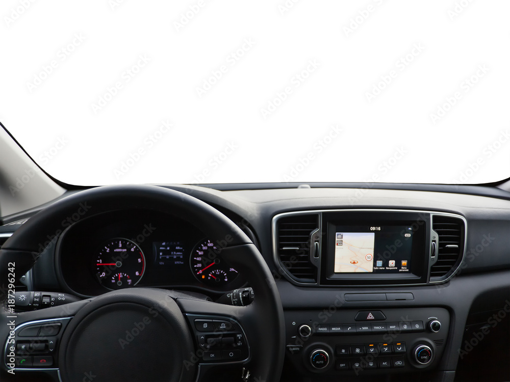 View of a car dashboard with satellite navigator. Focus on the steering wheel.
