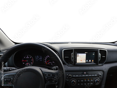 View of a car dashboard with satellite navigator. Focus on the steering wheel.