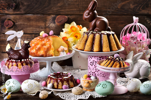 Photography assortment of various ring cakes for easter on festive table