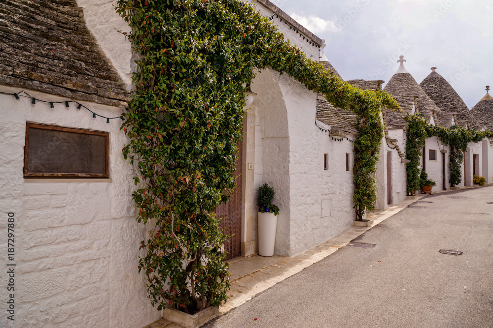 The charming street of Alberobello in southern Italy with typical architecture and Mediterranean atmosphere