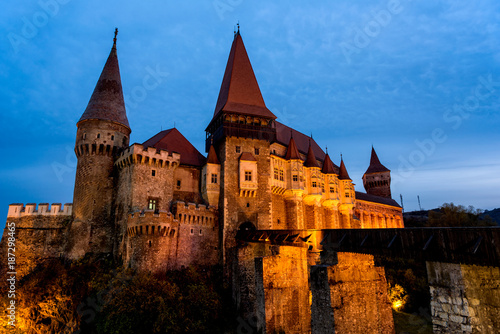 The gothic medieval fortress of Hunedoara in Romania, shot in the blue hour