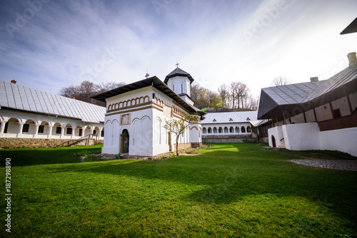 Orthodox monastery courtyard with church and monk rooms