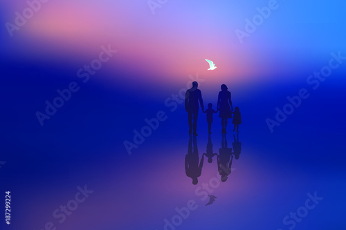 Famille à la plage le soir