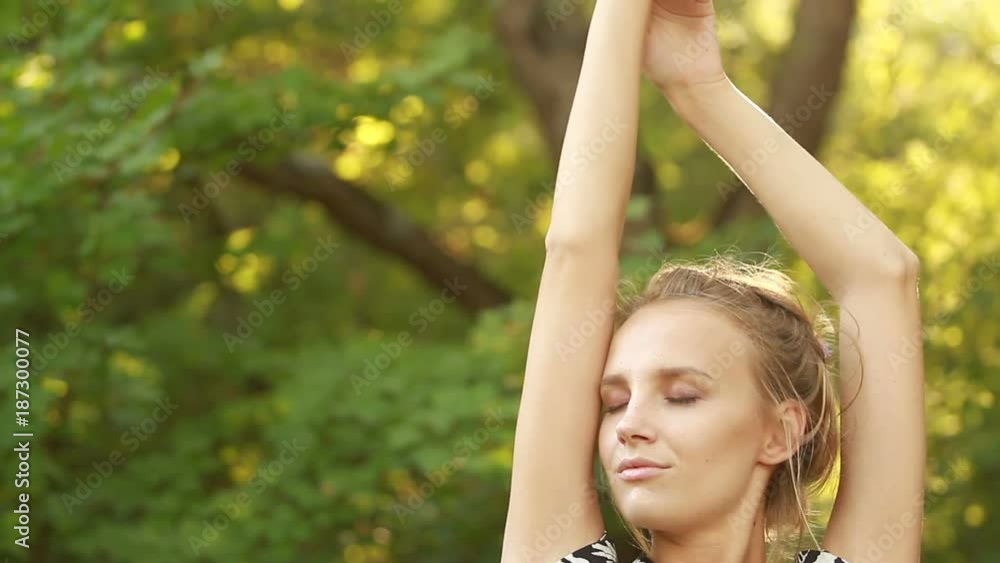 beautiful girl with closed eyes and raised hands beautiful girl with closed eyes and raised hands