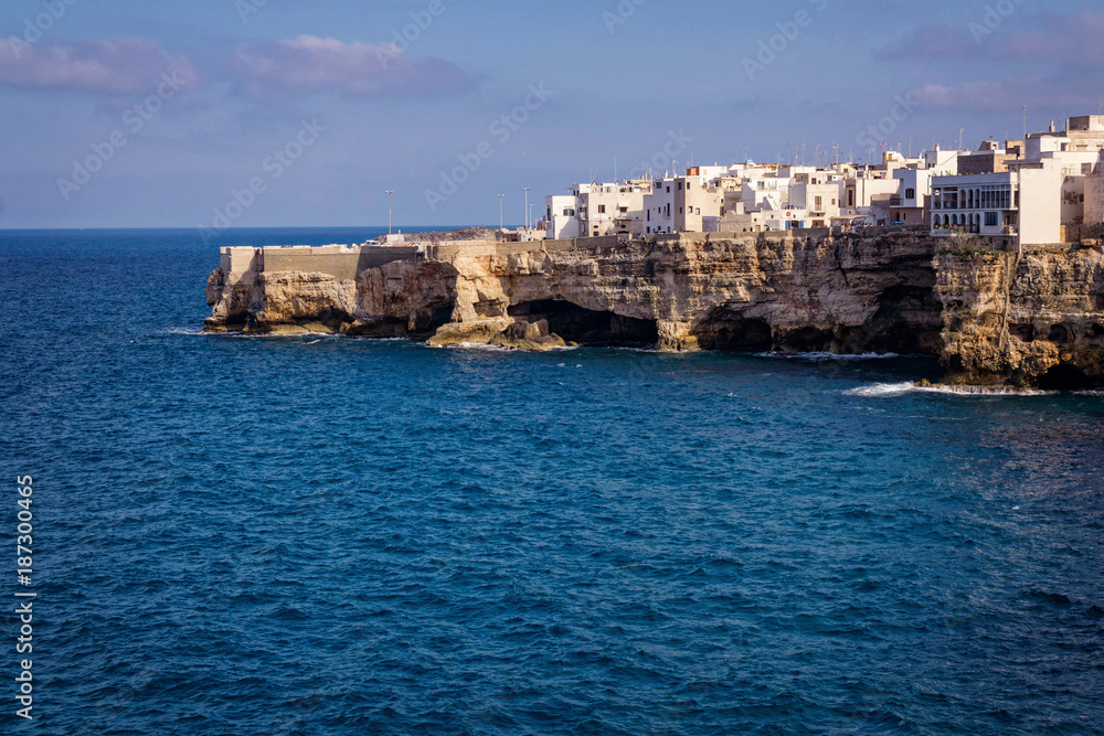 The scenic village of Polignano a Mare in Puglia Italy, with its beautiful houses above the sea The scenic village of Polignano a Mare in Puglia Italy, with its beautiful houses above the sea
