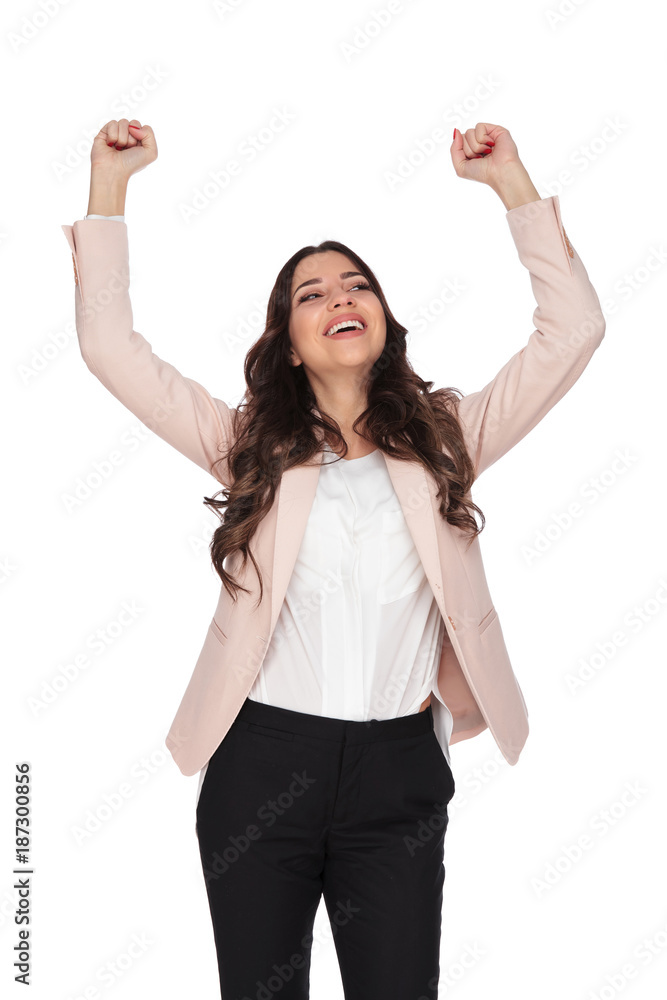 happy young business woman celebrating and looks up happy young business woman celebrating and looks up