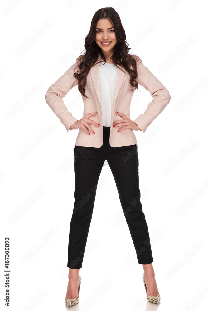 relaxed beautiful business woman with hands on waist relaxed beautiful business woman with hands on waist