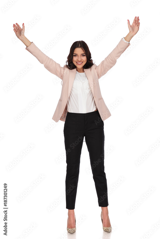 full body picture of a young businesswoman with hands up full body picture of a young businesswoman with hands up