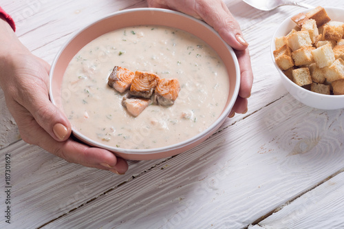 Cream soup with salmon photo