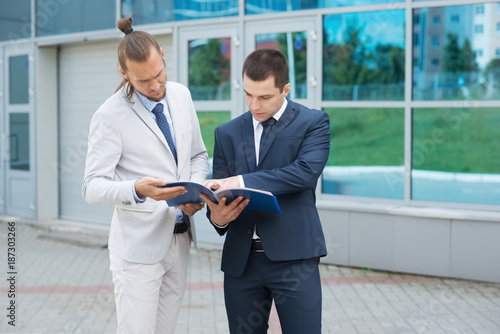 a businessman in a suit around the office