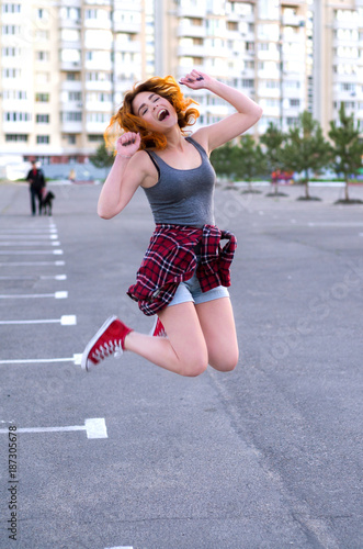 Redhead Hipster Girl Jumping