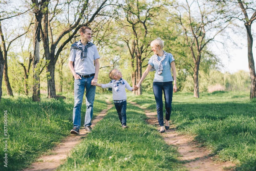 happy young family have fun in prak happy young family have fun in prak