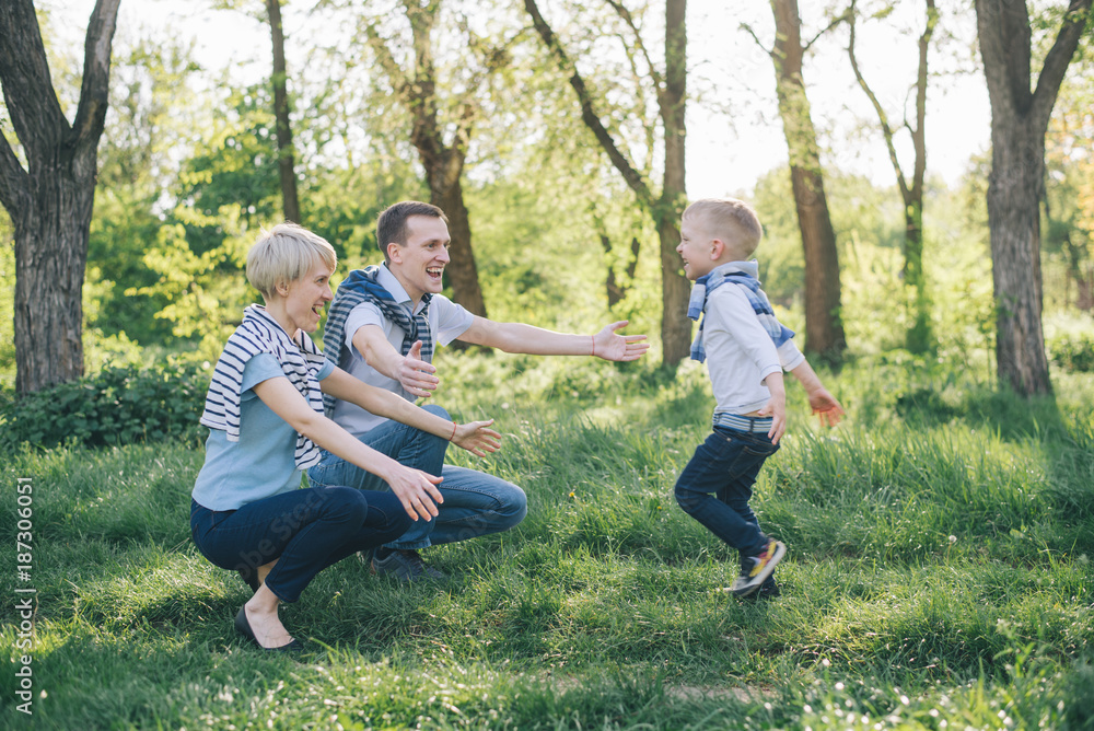 kid runs to father and mother