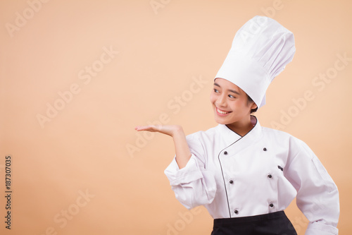 woman chef pointing hand to the side way