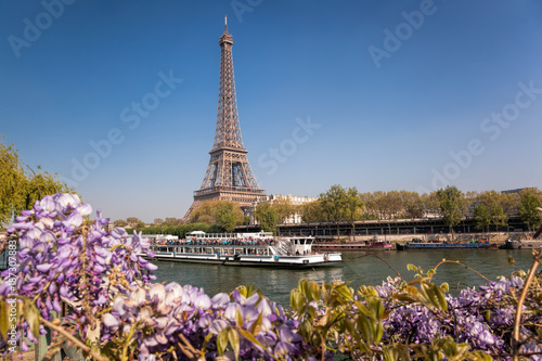 Eiffel Tower with boat during spring time in Paris, France