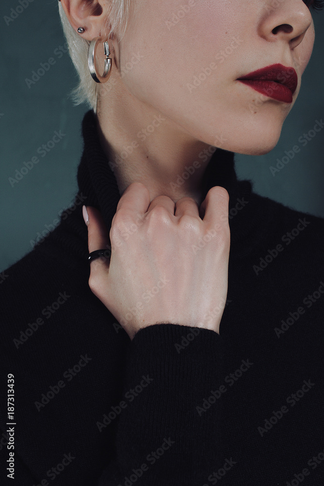 Beautiful blonde girl with red lipstick and dramatic emotions Beautiful blonde girl with red lipstick and dramatic emotions