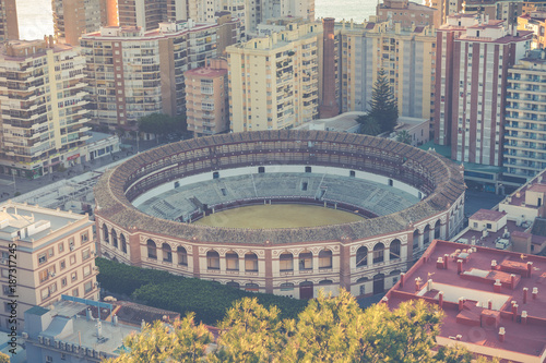 Aerial view at Malaga with Bullring of La Malagueta. Cityscape of Malaga with port and Bull arena, 18th Century Plaza de Toros de Ronda bullring in Malaga Spain