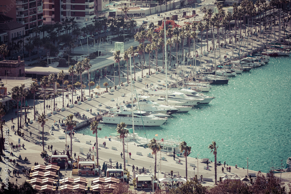 Panoramic view at the Marina place in Malaga. Malaga is the second-most populous city of Andalusia and the sixth-largest in Spain. Panoramic view at the Marina place in Malaga. Malaga is the second-most populous city of Andalusia and the sixth-largest in Spain.