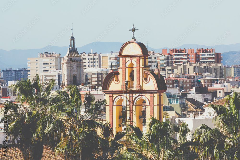 Malaga, Spain cityscape at the Cathedral, City Hall and Alcazaba citadel of Malaga.
