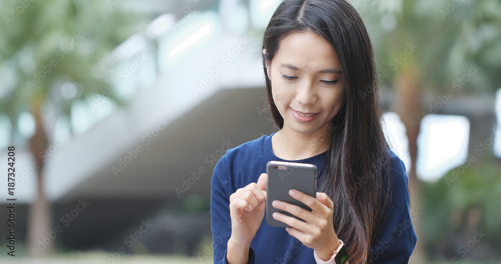 Woman use of mobile phone