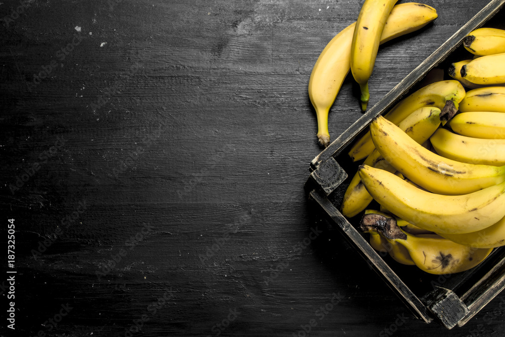Ripe bananas in an old box. Ripe bananas in an old box.