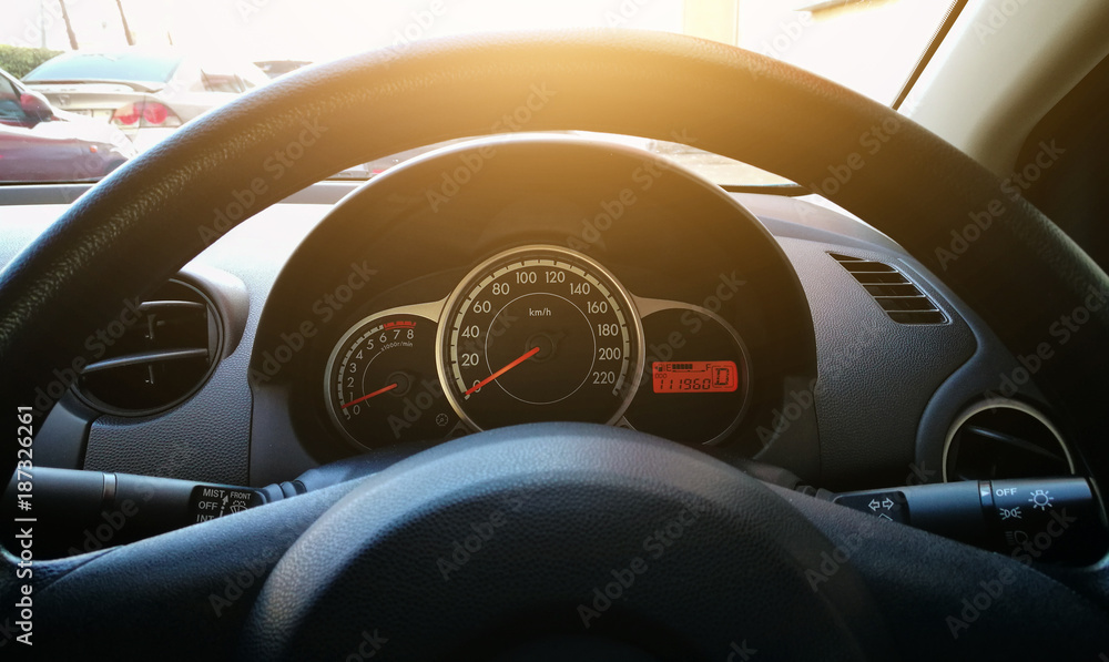 Modern Car Dashboard. Car Driving. Vehicle Steering Wheel And Dashboard Background.