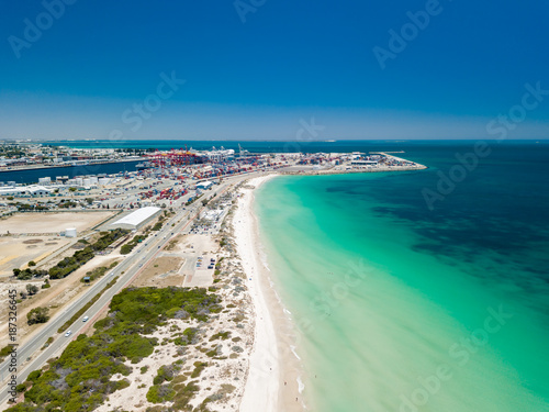 A busy Port Beach, Fremantle, on a stunning summer afternoon with turquoise water. Perth, Western Australia, Australia. Port Beach is a popular destination for locals and tourists visiting Perth.