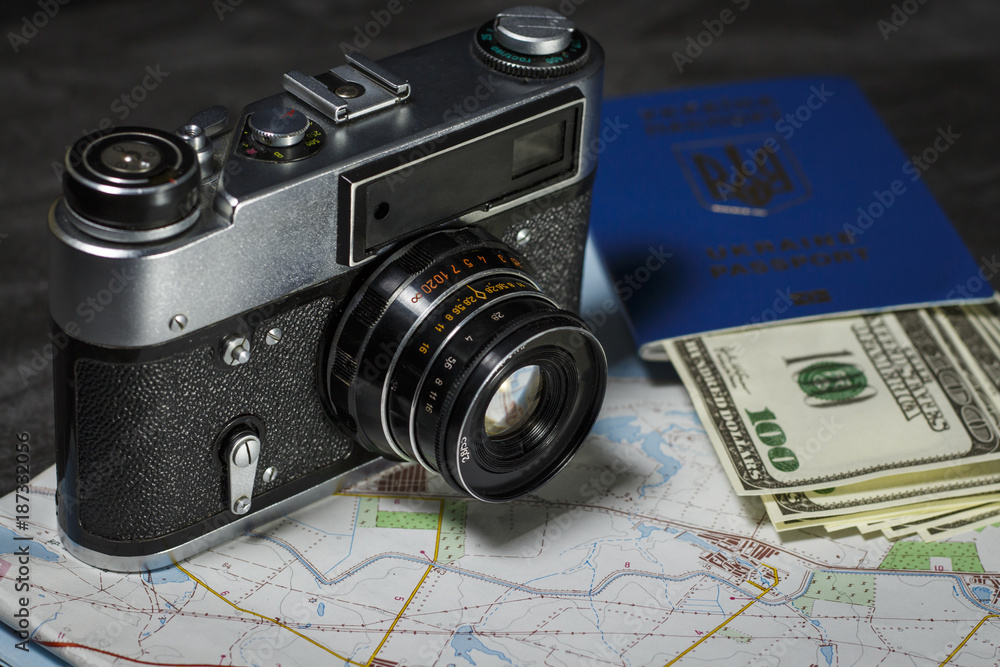 Set for travel: passport, money card and camera