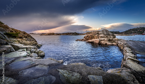 Old Stone Pier in Helleviga recreation area, blue hour in South Norway photo