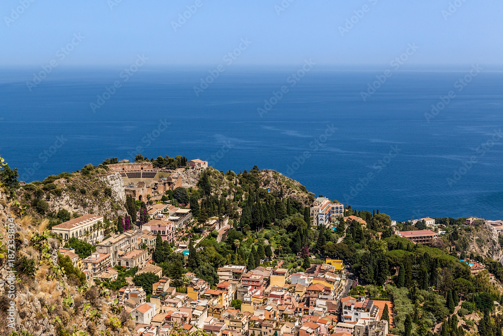 Taormina, Sicily, Italy. A picturesque view of the city and the ancient Greek theater from Mount Monte Tauro