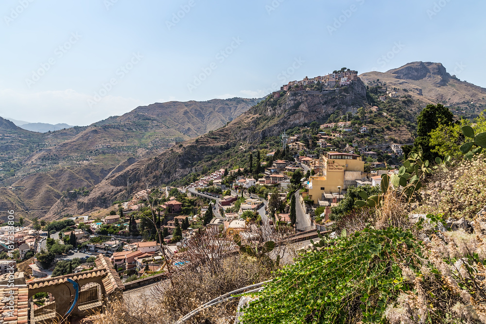 Taormina, Sicily, Italy. City above the city: on top of the cliff the town of Castelmola